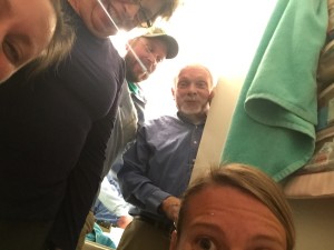 What are we doing all crammed in the tiny bathroom??
