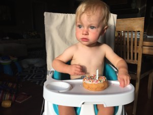 On Tyler's actual birthday, Daddy was out of town. So he got to eat a birthday donut with Mommy.